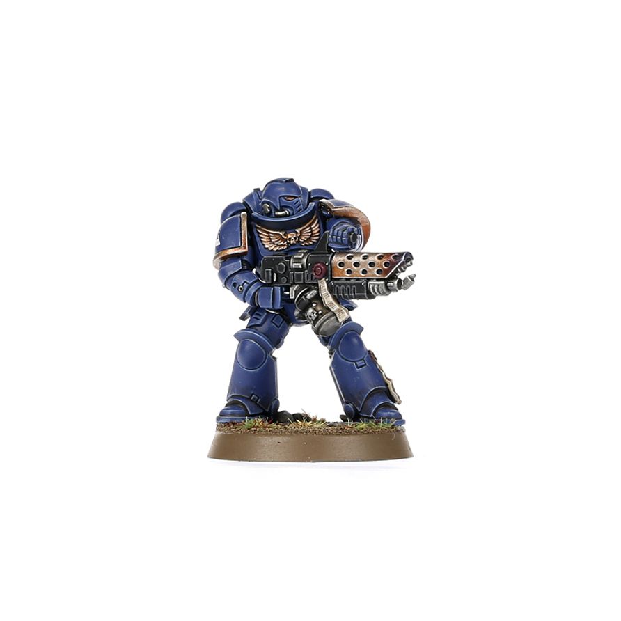 Miniature figure in blue and brown armor holding a weapon on a white background